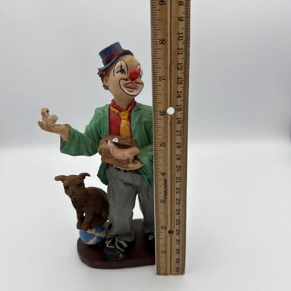 Vintage Clown Figurine With Bird In Hand And Dog Standing On A Ball